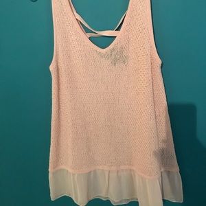 Cream tank, cross in back sheer ruffles at bottom